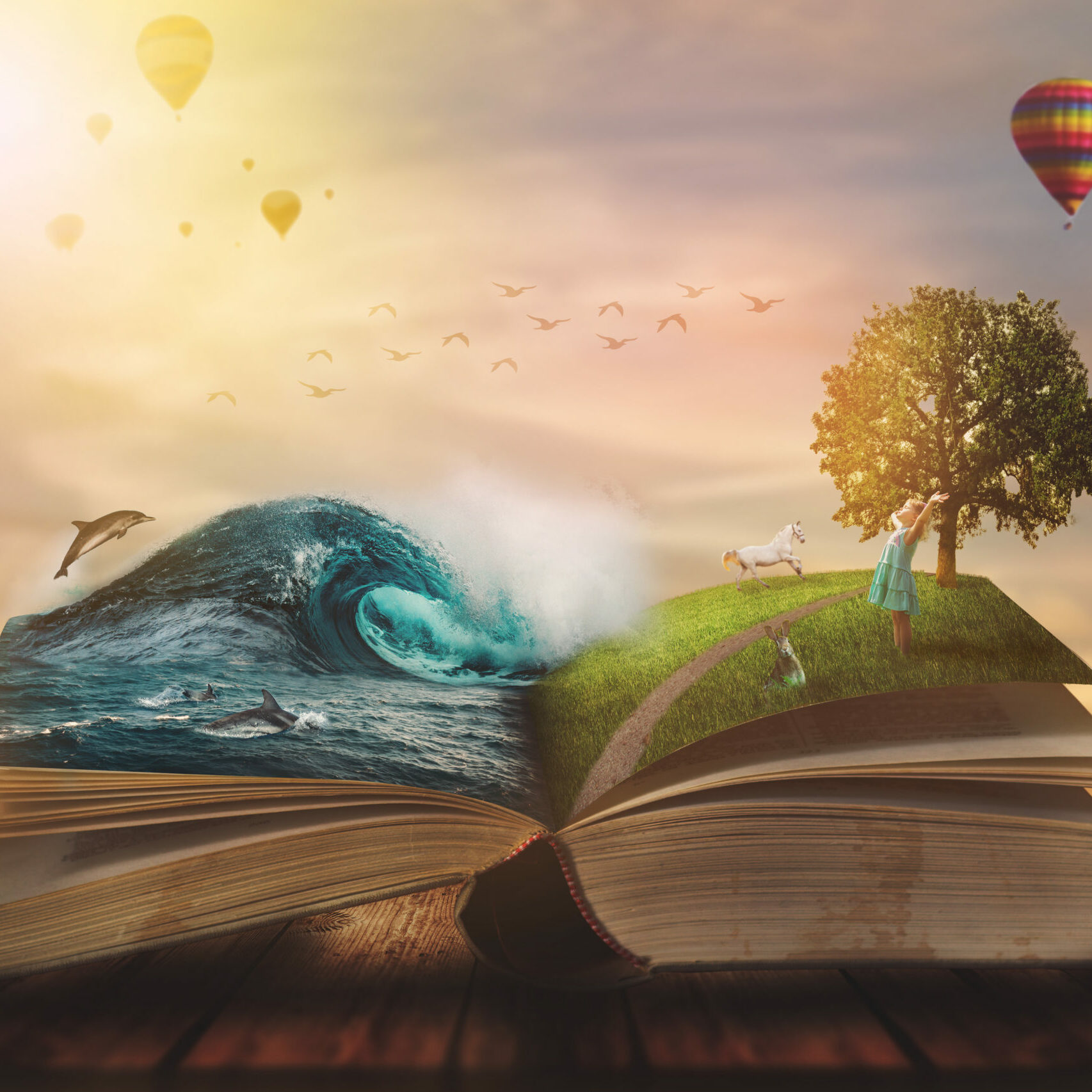 Concept of an open magic book; open pages with water and land and small child. Fantasy, nature or learning concept, with copy space
